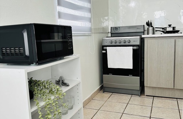 Tropical 2BR Apt +Priv Bath and Parking in Gurabo