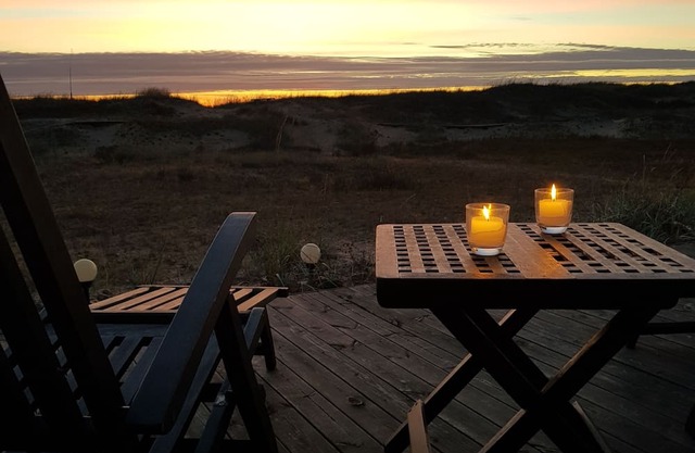 Small beach house by the sea with an amazing view from the balcony. nnn