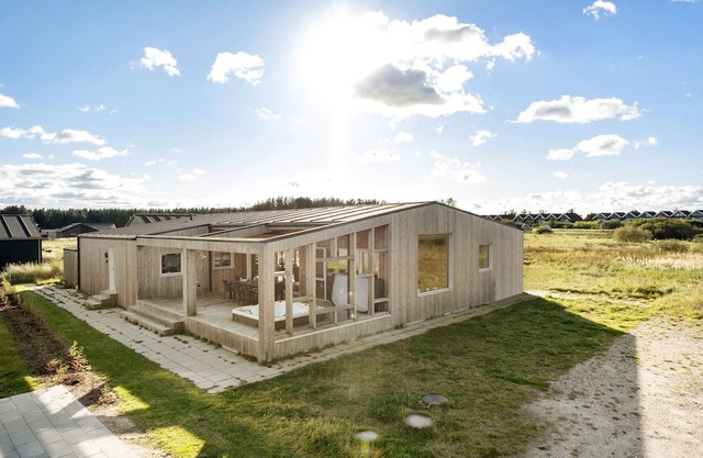 Spend your next holiday in this beautiful wooden house in Løkken.