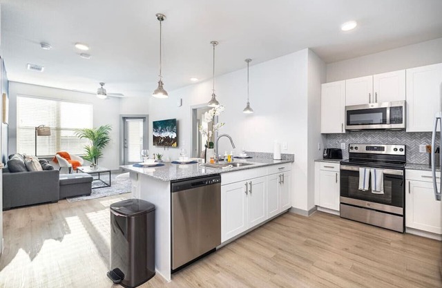 Elegant 2BD: Pool, Fitness & Organized Workspace
