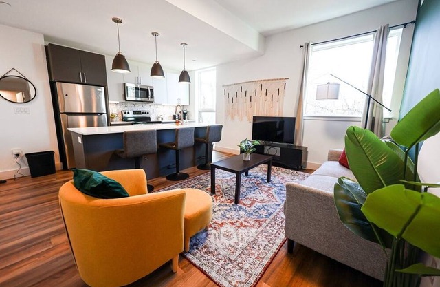 Imagine a stylish escape in Glenwood, the epitome of urban luxury