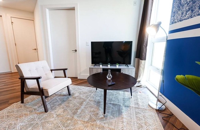 Imagine a stylish escape in Glenwood, the epitome of urban luxury
