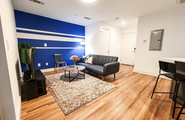 Imagine a stylish escape in Glenwood, the epitome of urban luxury