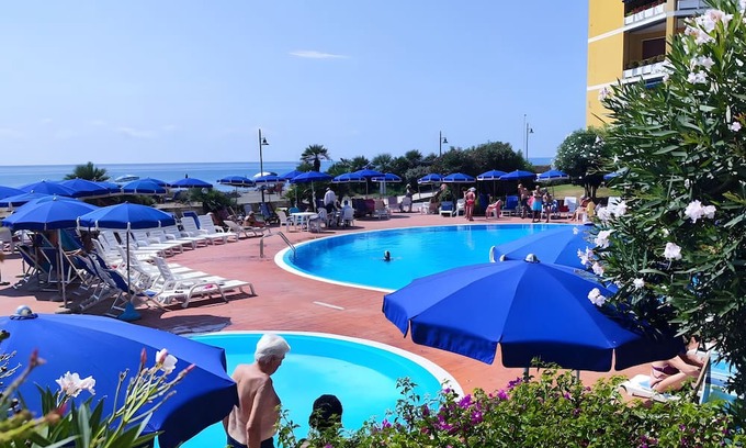 San Lorenzo al Mare Apartment | Apartment 'A Casa Di Vale' with Shared Pool and Shared Garden