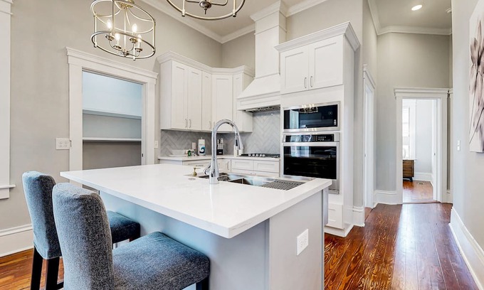 Metropolitan House | Dog-friendly duplex with front porch, fenced yard & walkable location