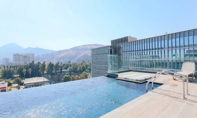 Las Condes Apartment | High Studio, Gym and Parking
