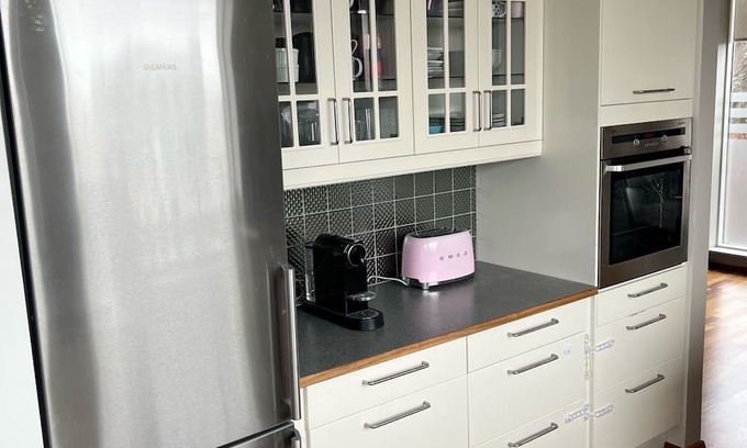 Breidholt House | Family friendly house 15 minutes from downtown Reykjavik - Big garden w/hot tub!