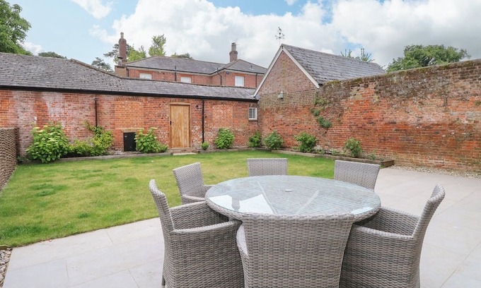 Tunstead Cottage | THE COACH HOUSE, pet friendly, with pool in Stalham