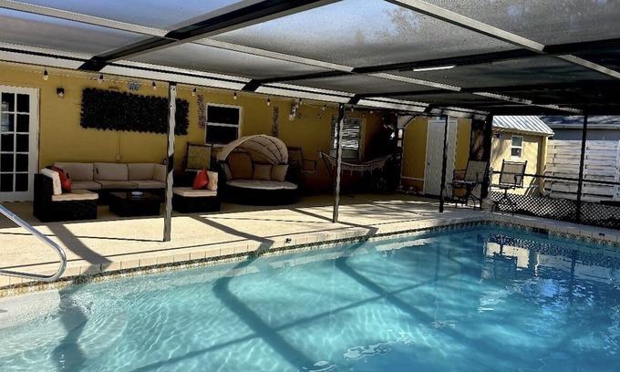 Fruitville House | 9 miles to beaches. Screened and heated pool. 3 miles to NATHAN BENDERSON PARK.