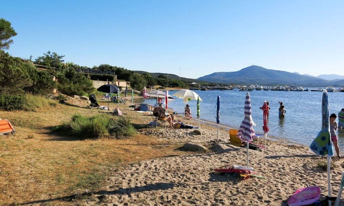 Porto Rotondo Apartment | Lovely apartment for 2 guests with WIFI, pool, A/C, TV, terrace, pets allowed and parking