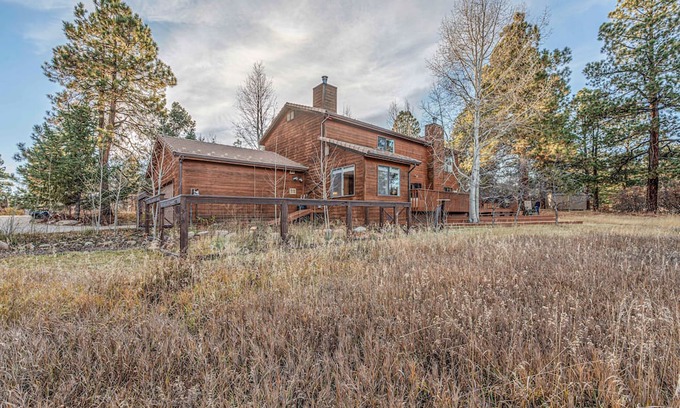 Durango West House | Nestled back from the road behind tall aspens w/ private views of open space