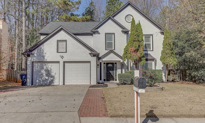 Lawrenceville Cottage | Spacious Lawrenceville Retreat w/ Fireplace + Deck