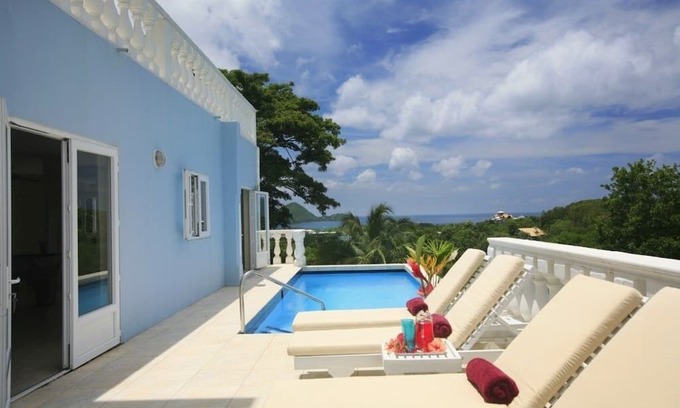 Cap Estate Villa | Fairway And Ocean Views - Blue Moon 4 Bedroom Villa by RedAwning