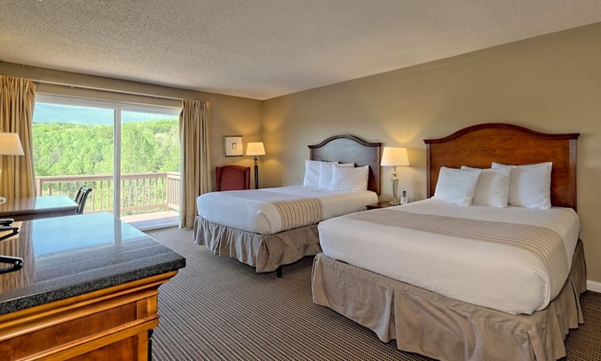 Clayton Condo | KW 208 Two Queen Unit