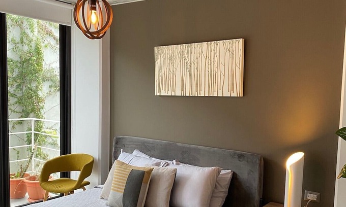Zona 8 Apartment | Luxury Cayala 2BR/2BA suite w/sunlit balcony near US Embassy, modern amenities.