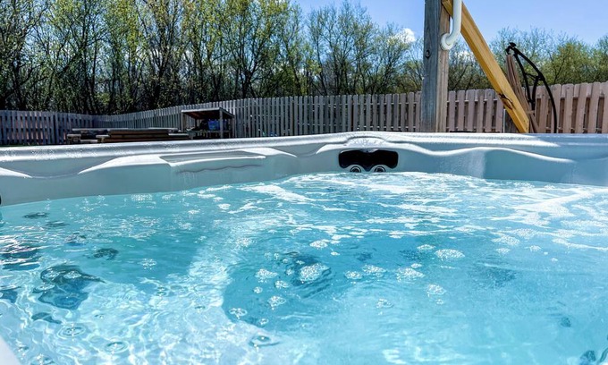 Deerfield House | Spacious Home + Fire Pit, Waterfall, Hot Tub, Home Theater! 20 min to DT Madison