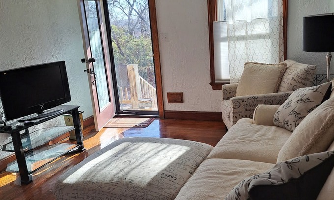 Spring Grove Village House | Charming woodside cabin feel.