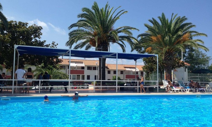 Falerna Apartment | Holiday Apartment "Trilocale 37 Residence La Giungla" with Sea View, Shared Pool & Wi-Fi