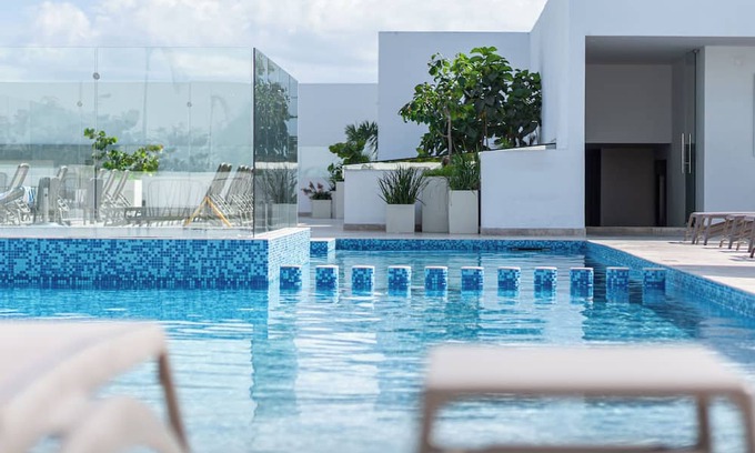Gonzalo Guerrero Condo | Luxury Beach Condo with 4 Rooftop Pools, huge Gym, Bar, Restaurant, kids club & Spa