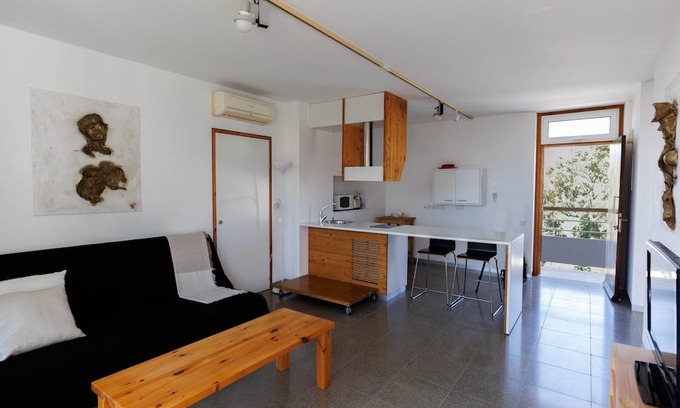 Pentakomo Apartment | Euploia | One-Bedroom Apartment, Art by PraXis Apartments