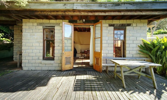Pigeon Bay Apartment | The Mud House— earth studio in Pigeon Bay with views, wood-fired sauna & bath!