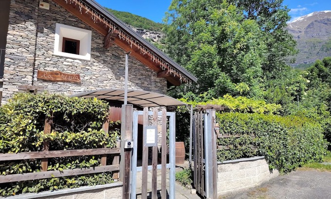 Novalesa Apartment | Comfortable detached apartment with garden and balcony.