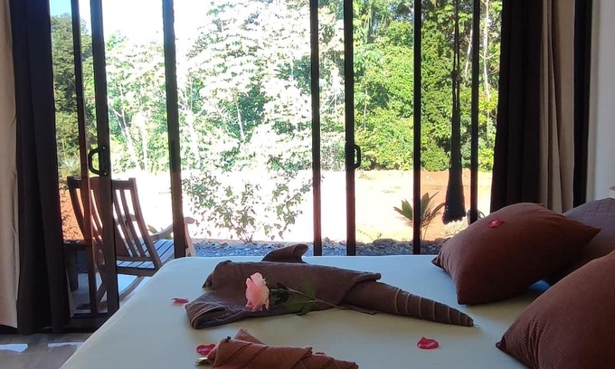 Las Lomas Bed & Breakfast | Kocorica Private room with terrace and bathroom in the countryside.